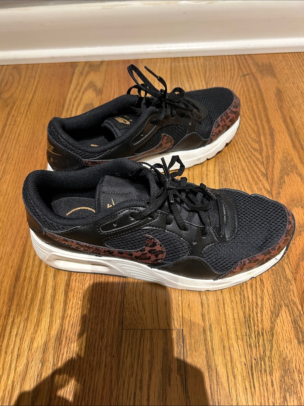 Nike Women's Black Athletic Sneakers with Brown Leopard Accents